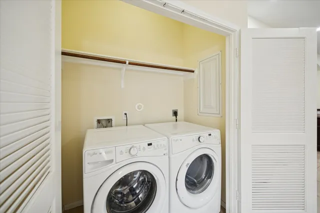 a utility room with dryer and washer