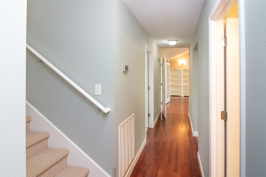 735 Britton Street Anderson, SC 29621 - Photo 36 of 50 This spacious hallway features polished hardwood floors and direct access to an adjacent room.