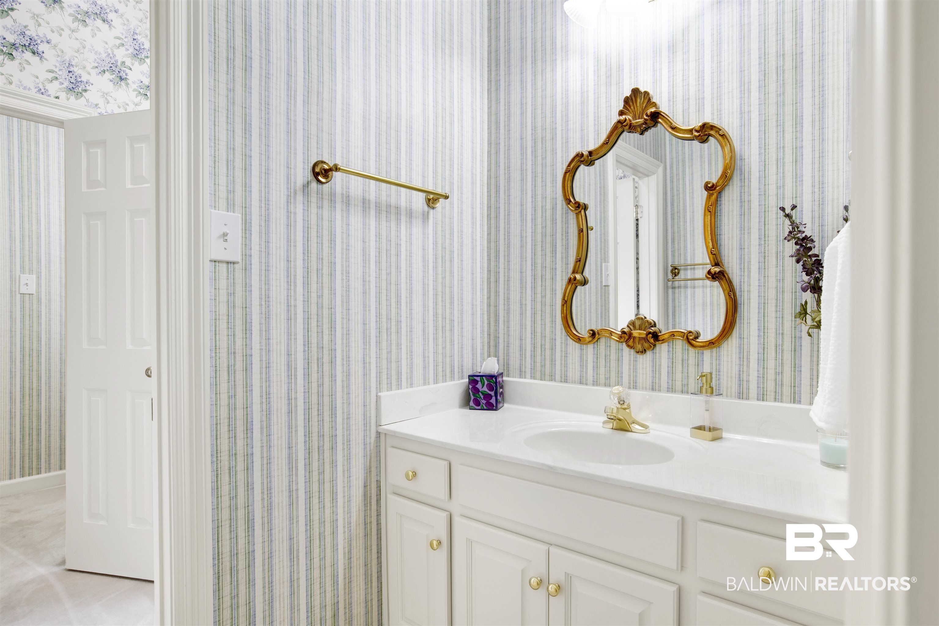 106 Old Mill Road Fairhope, AL 36532 - Photo 34 of 49 Bathroom featuring wallpapered walls and vanity