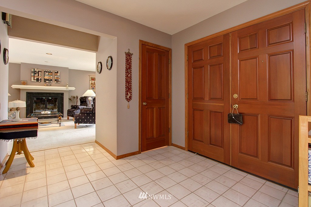 2649 Northwest 96th Street Seattle, WA 98117 - Photo 3 of 25 a view of a entryway door with interior in the background