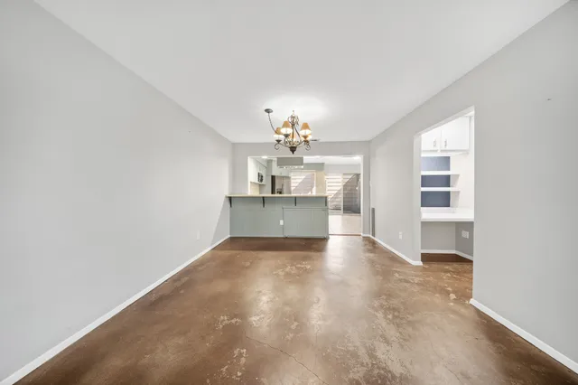 a view of a kitchen with a sink and cabinet