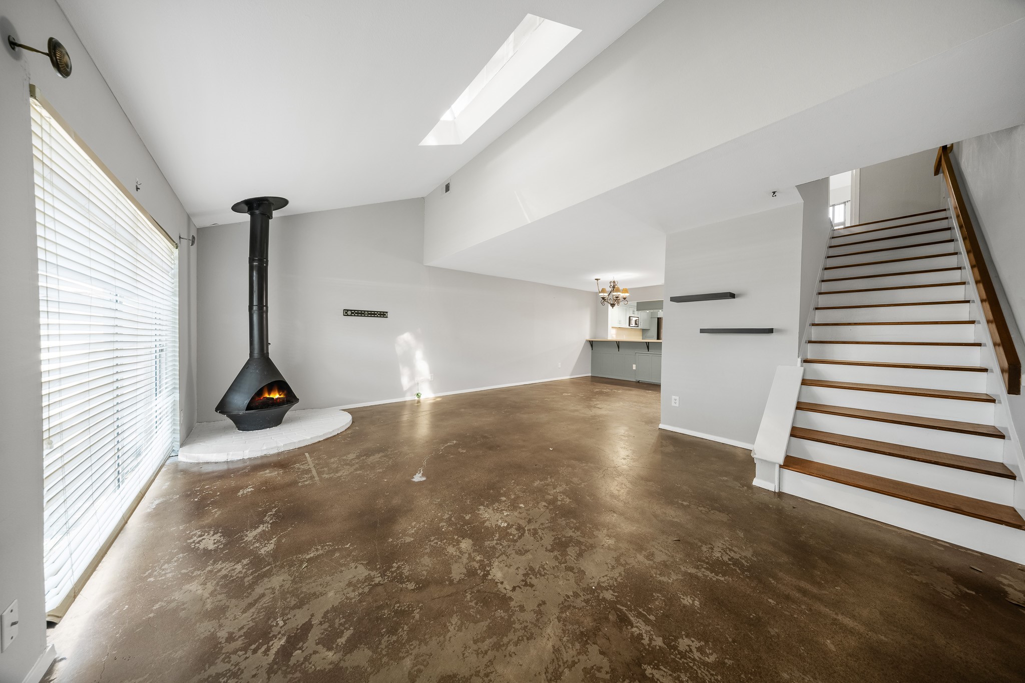 5814 Langfield Road, Unit 5814 Houston, TX 77092 - Photo 16 of 35 a view of a room with gym equipment and stairs