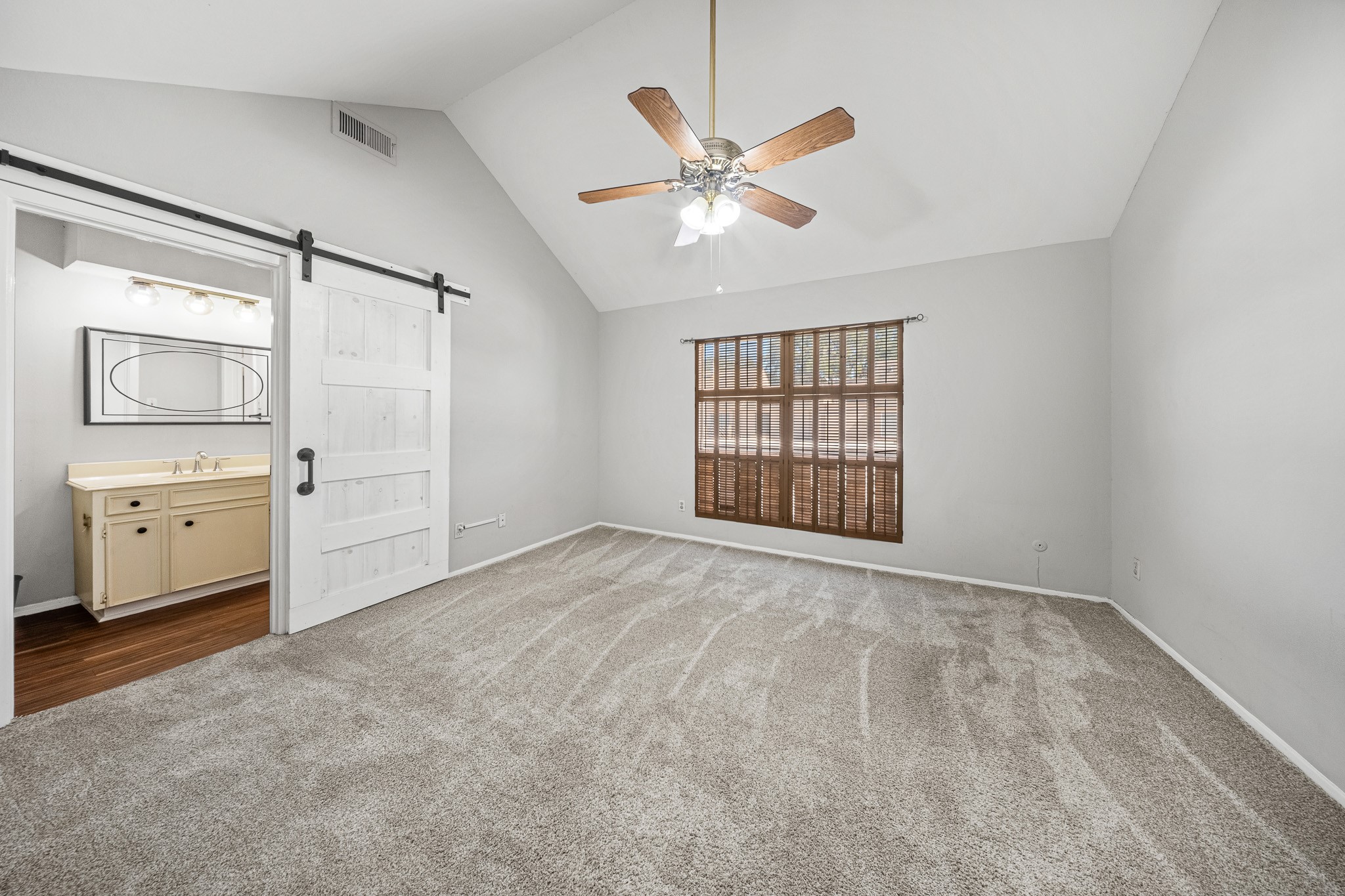5814 Langfield Road, Unit 5814 Houston, TX 77092 - Photo 19 of 35 a view of an empty room with a window