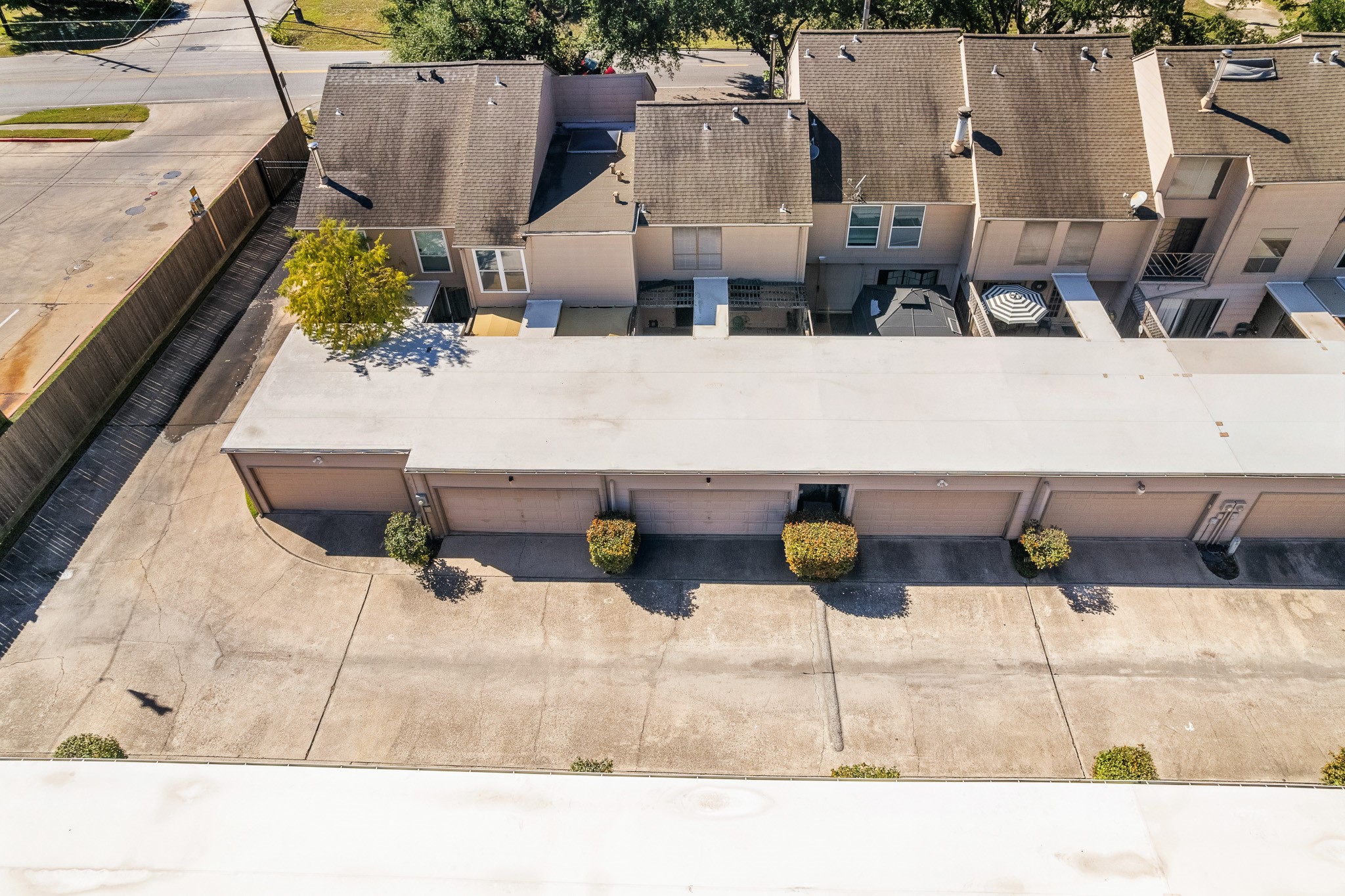 5814 Langfield Road, Unit 5814 Houston, TX 77092 - Photo 33 of 35 a outdoor living space with furniture and a view of kitchen