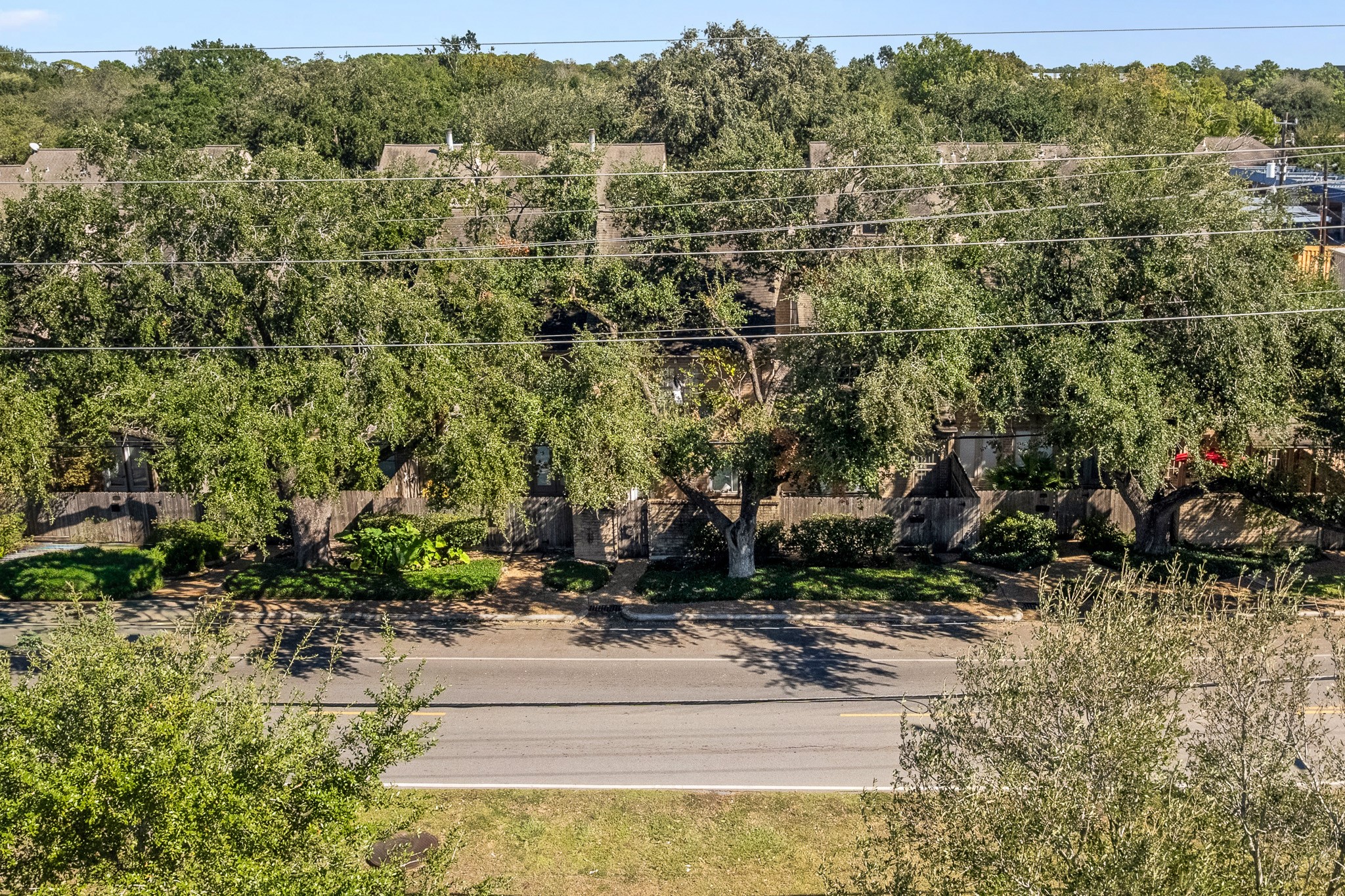 5814 Langfield Road, Unit 5814 Houston, TX 77092 - Photo 34 of 35 a view of a park with large trees