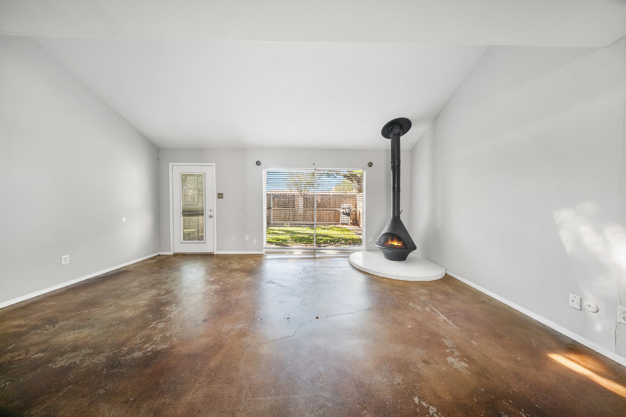 5814 Langfield Road, Unit 5814 Houston, TX 77092 - Photo 5 of 35 a view of an empty room with a window