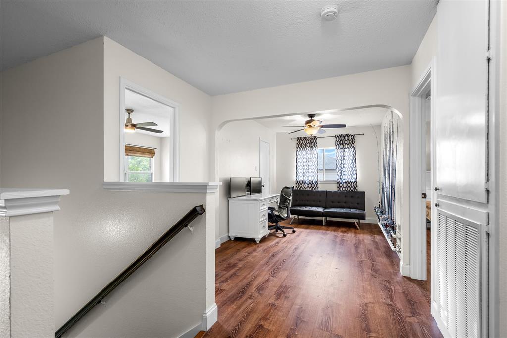 1901 Yellowstone Lane Corinth, TX 76210 - Photo 16 of 32 Office space with arched walkways, dark wood-type flooring, and ceiling fan