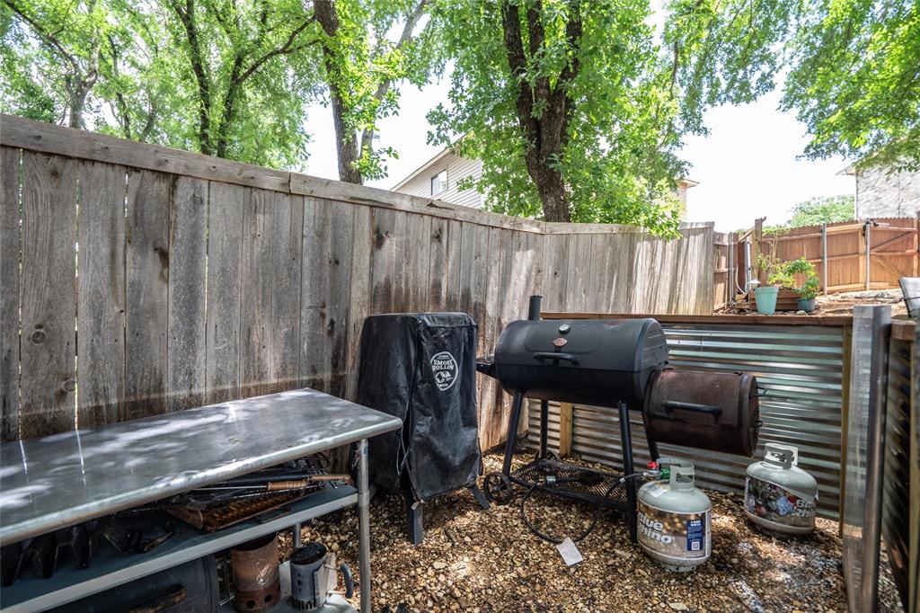 1901 Yellowstone Lane Corinth, TX 76210 - Photo 23 of 32 View of fenced backyard