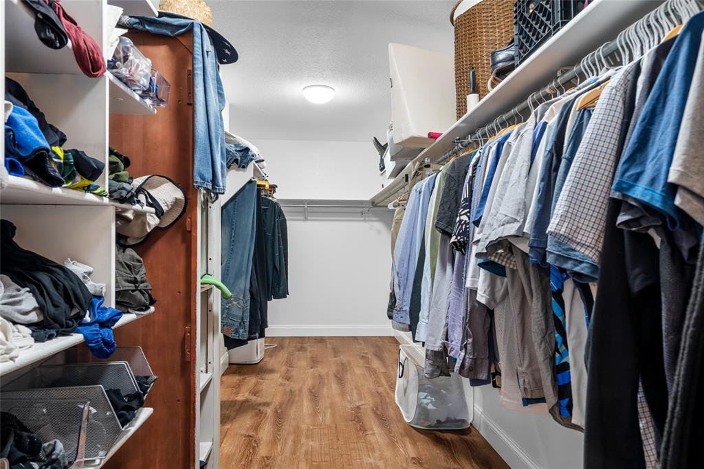 1901 Yellowstone Lane Corinth, TX 76210 - Photo 29 of 32 Walk in closet with light wood-type flooring