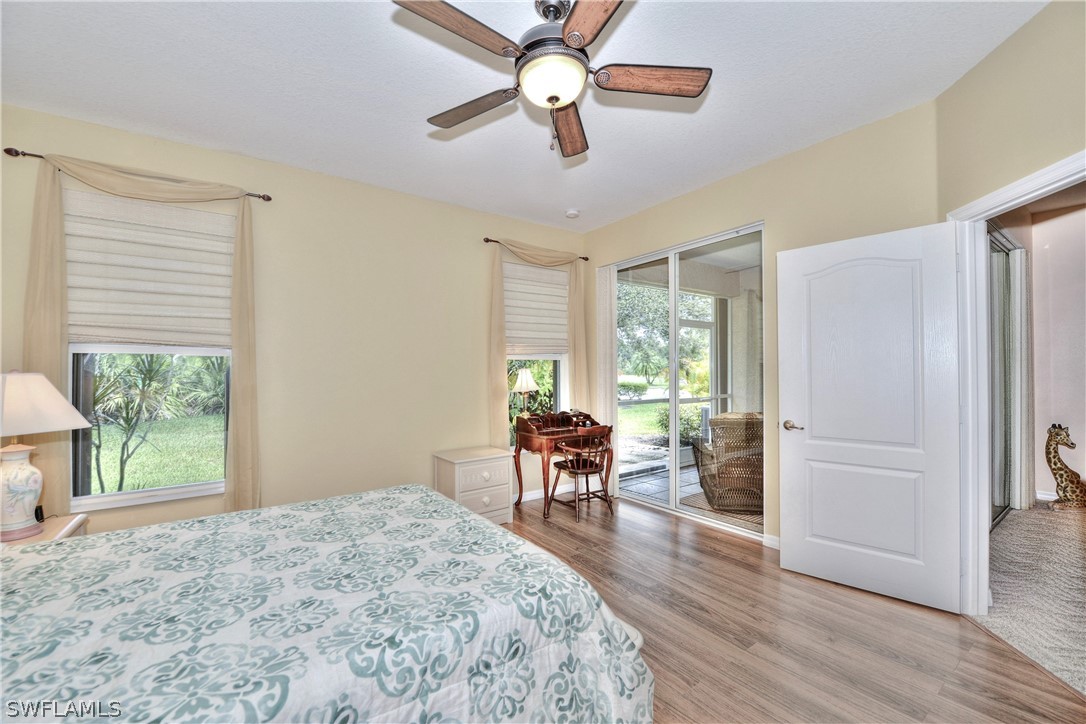 3600 Rue Alec Loop, Unit 5 North Fort Myers, FL 33917 - Photo 13 of 16 a view of a livingroom with furniture window and wooden floor