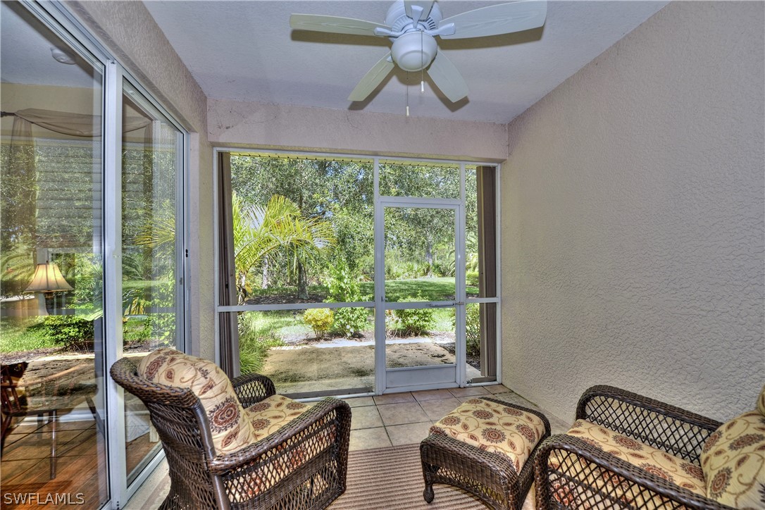 3600 Rue Alec Loop, Unit 5 North Fort Myers, FL 33917 - Photo 15 of 16 a living room with furniture and a large window