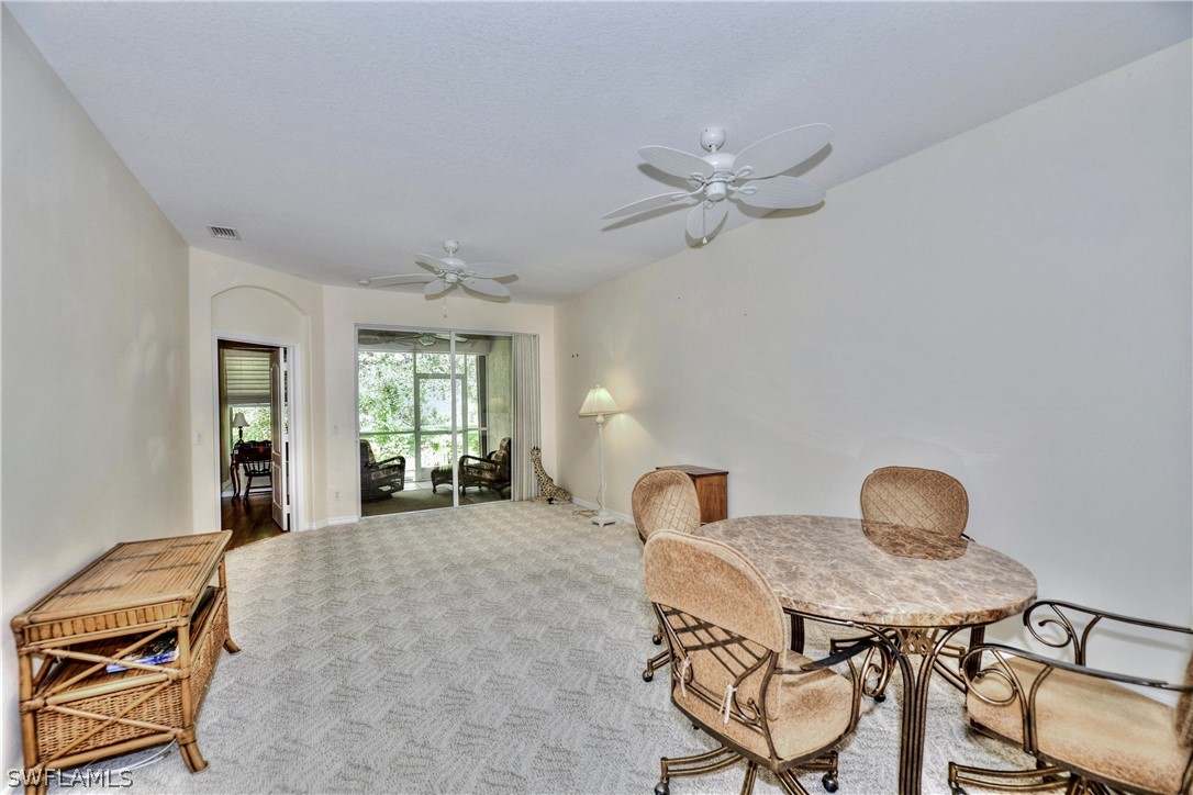 3600 Rue Alec Loop, Unit 5 North Fort Myers, FL 33917 - Photo 4 of 16 a living room with furniture