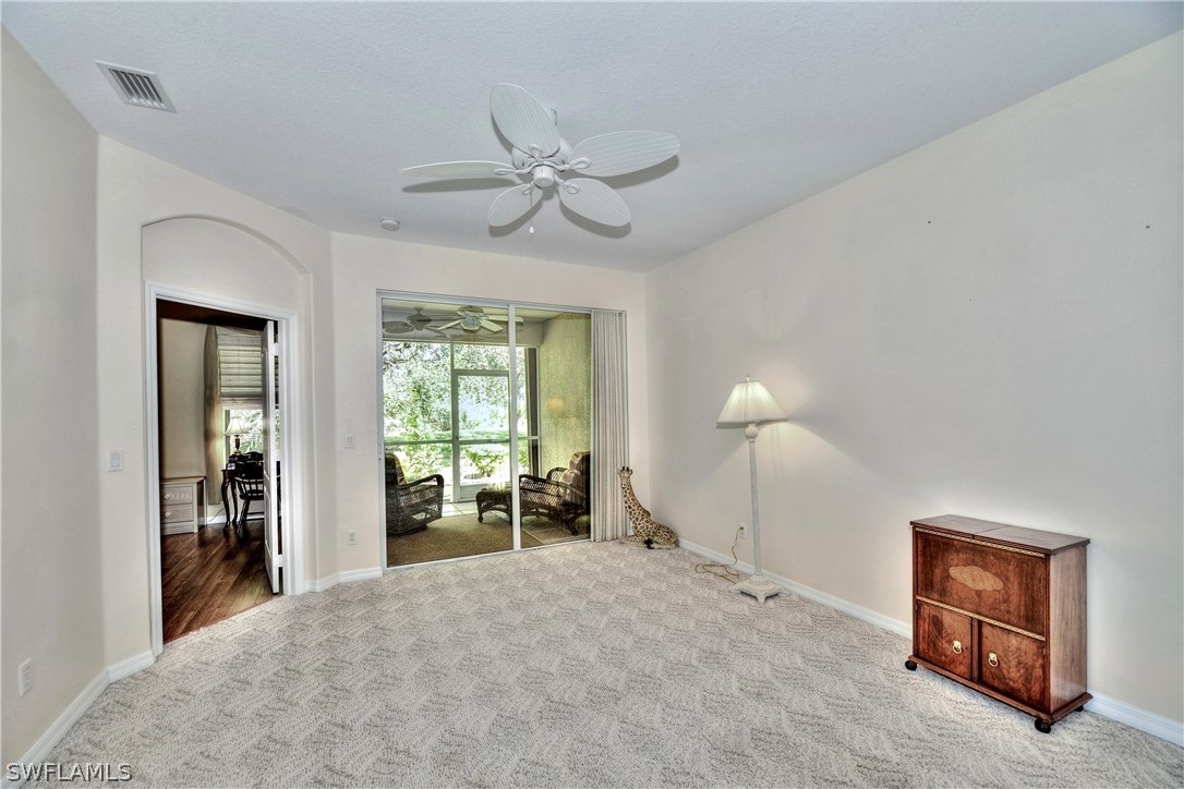 3600 Rue Alec Loop, Unit 5 North Fort Myers, FL 33917 - Photo 5 of 16 a view of a livingroom with a flat screen tv