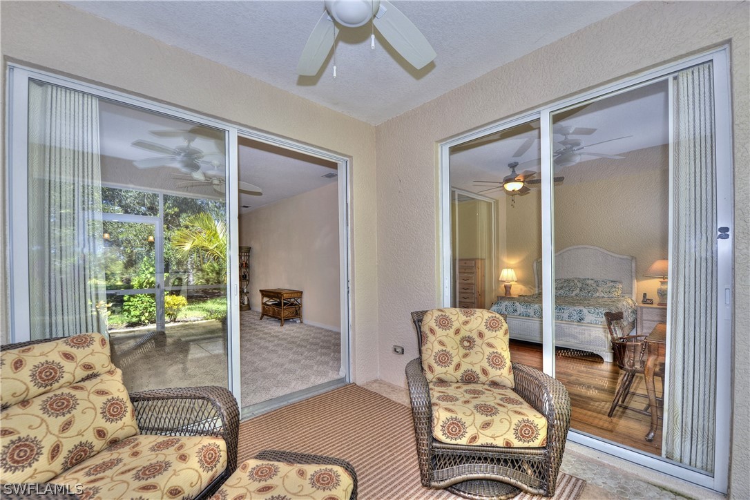 3600 Rue Alec Loop, Unit 5 North Fort Myers, FL 33917 - Photo 6 of 16 a living room with furniture and a large window