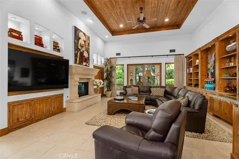a work room with furniture and book shelf