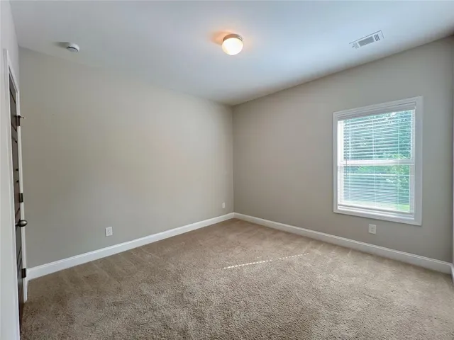 a view of a living room with furniture