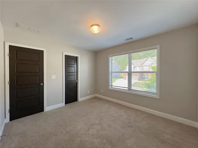 a view of backyard with green space