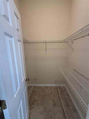 a view of a room with racks on the wall