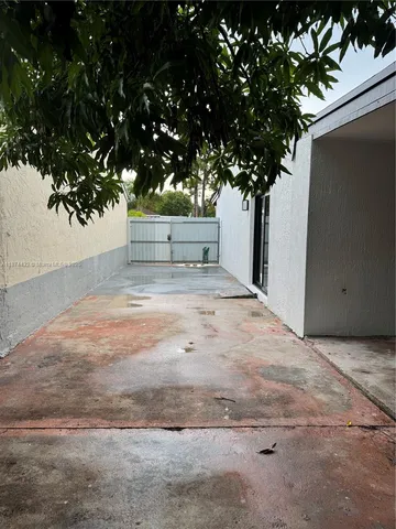 a view of a tree with an outdoor space