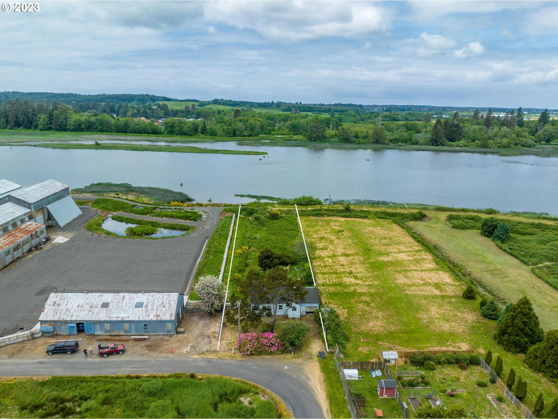 92182 Front Road Astoria, OR 97103 - Photo 21 of 21 an aerial view of a house with a lake view