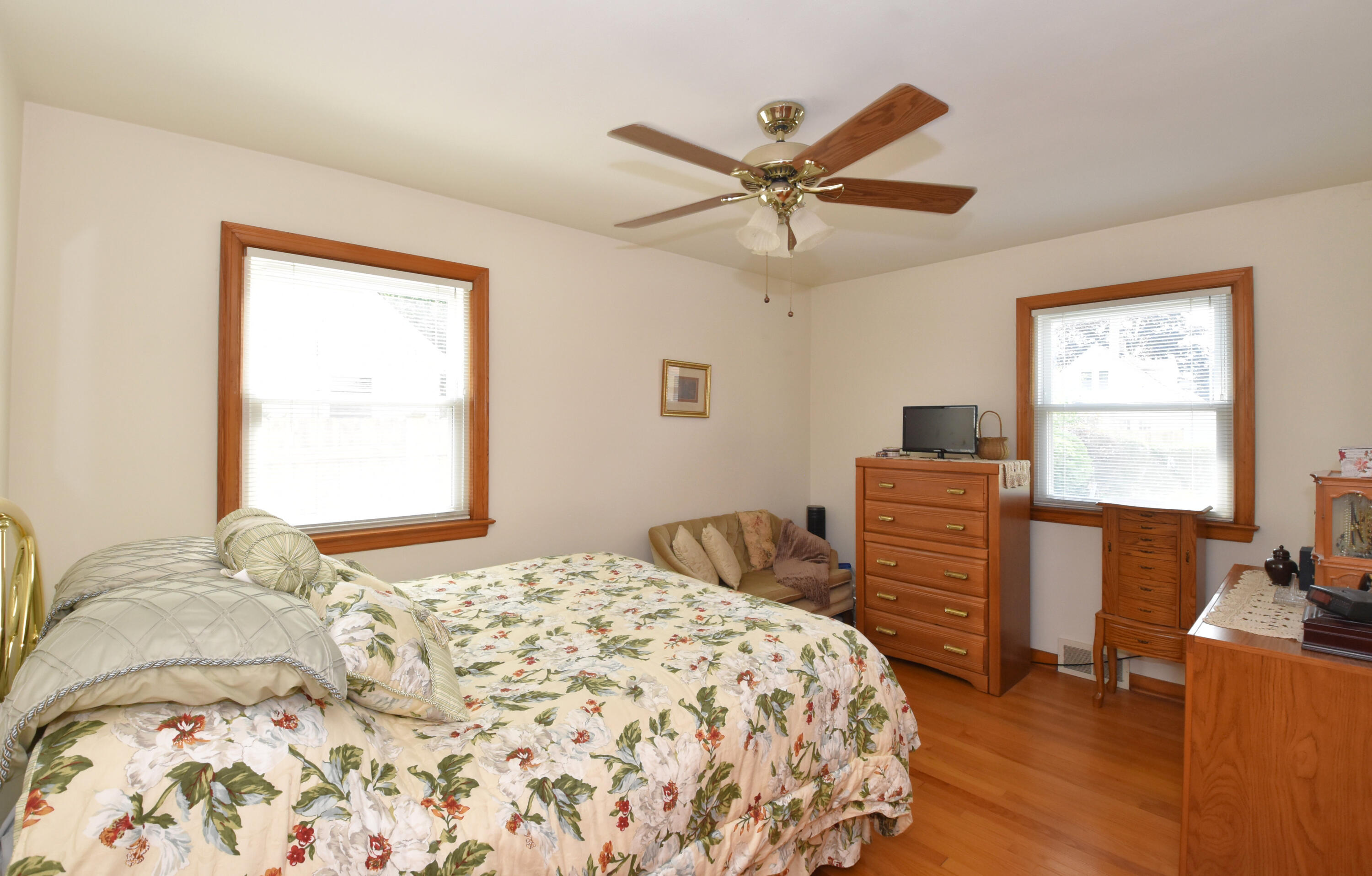 1923 Arlington Avenue Racine, WI 53403 - Photo 13 of 31 Beautiful hardwood floors in this spacious Primary Bedroom.