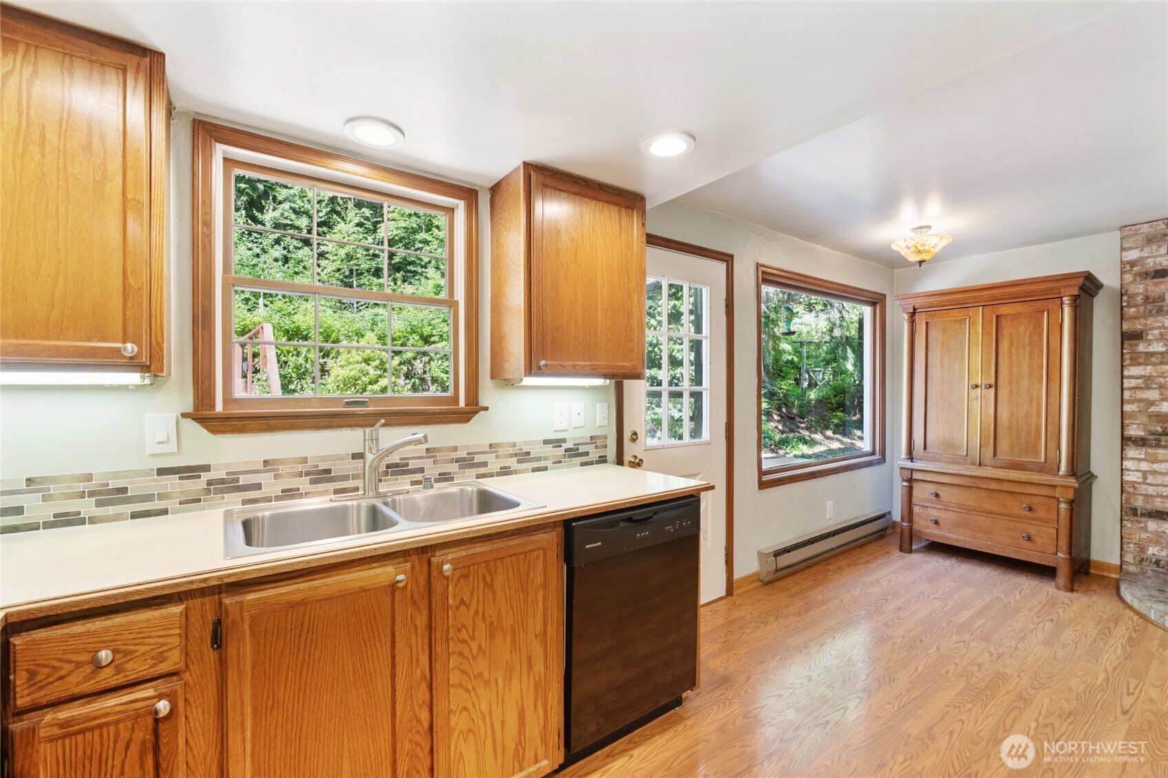 2216 Newberg Road Snohomish, WA 98290 - Photo 13 of 32 a kitchen with a sink and a window