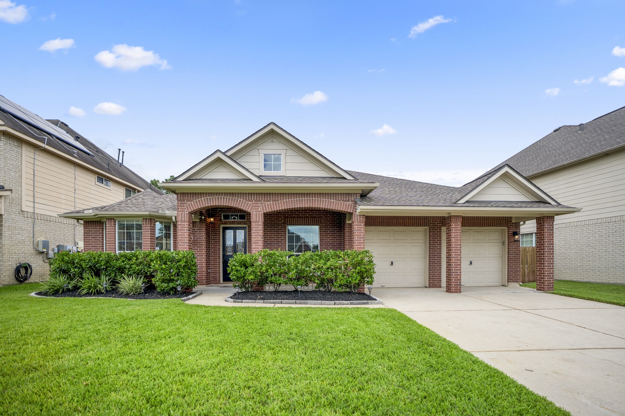 3411 Utah Beach Court Spring, TX 77388 - Photo 46 of 50 Welcome to 3411 Utah Beach Court, where nearly 3,000 sq ft on one level begins with a classic covered front porch, mature landscaping, and a cul-de-sac setting in Normandy Forest. The front bay window hints at the formal living space just inside, while the covered entry leads into a floor plan with two living areas, two dining spaces, a study, and generous room to live without stairs.