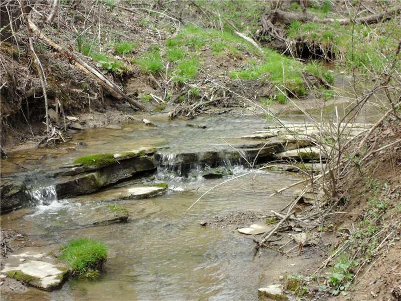 1033 Gombach Road Claridge, PA 15623 - Photo 24 of 25 Other. Small creek runs through the middle/back yard (you can easily cross or jump over it in most places). This area of rocks forms a small natural waterfall!
