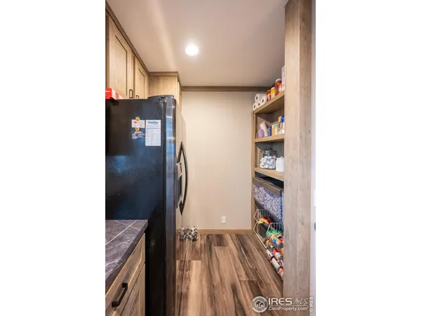 a kitchen with stove and cabinets