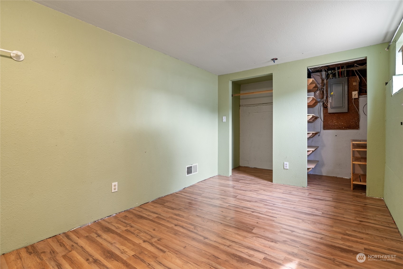 3106 Southeast 5th Street Renton, WA 98058 - Photo 15 of 21 a view of a room with wooden floor and closet