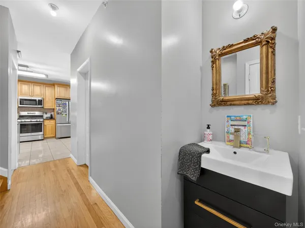 a bathroom with a sink and a mirror