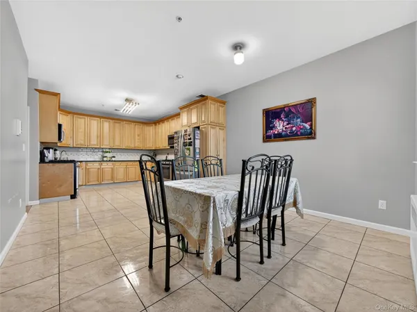 a view of kitchen with furniture and window
