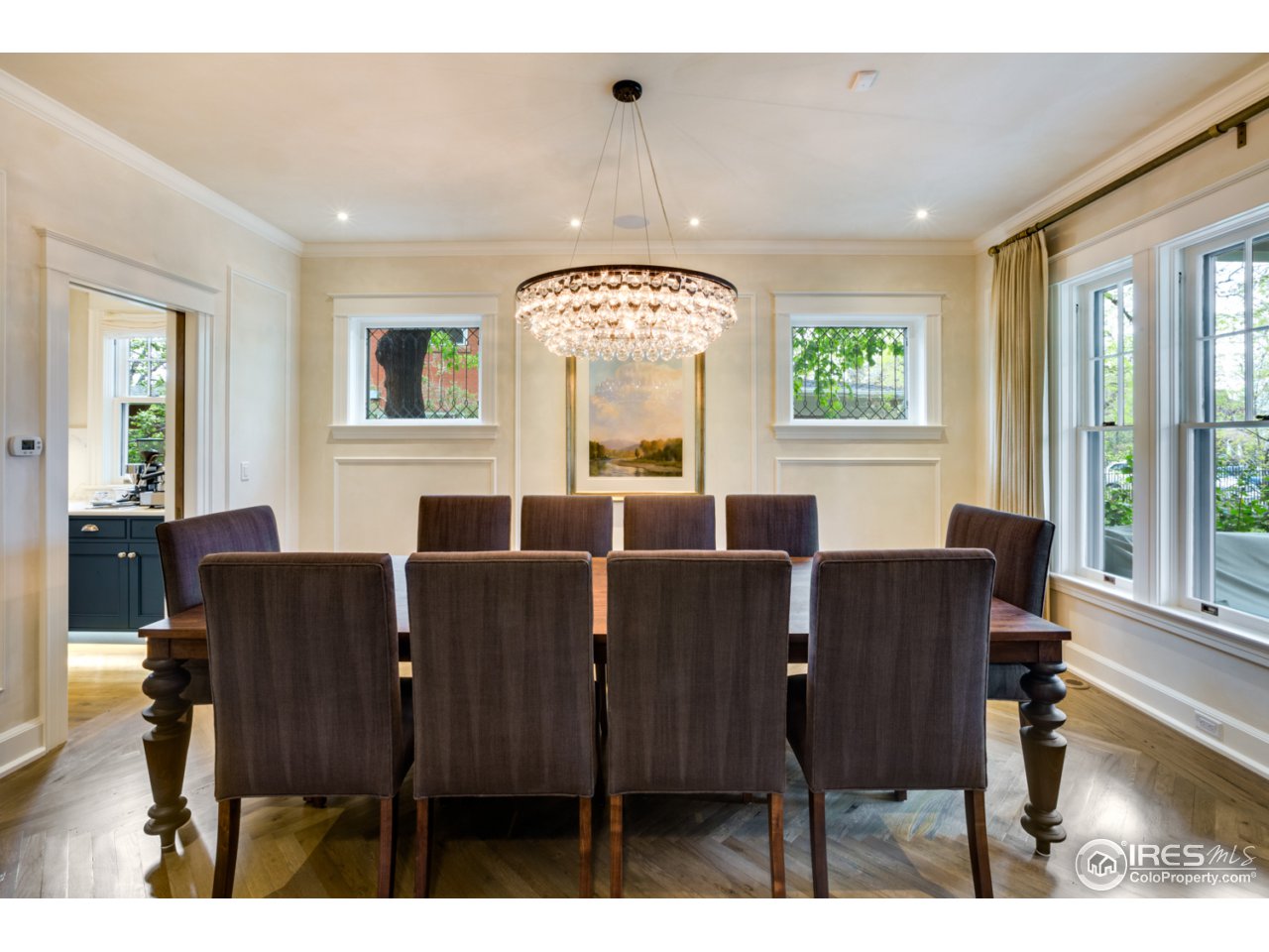 933 Mapleton Avenue Boulder, CO 80304 - Photo 6 of 14 a view of a dining room with furniture and windows