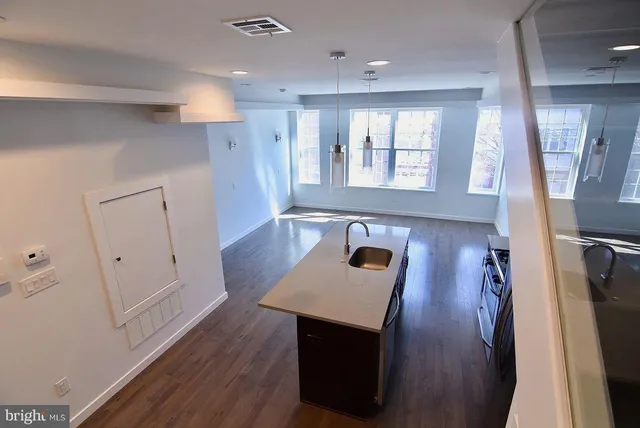 a view of an empty room and window