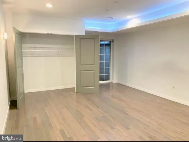a view of an empty walk in closet