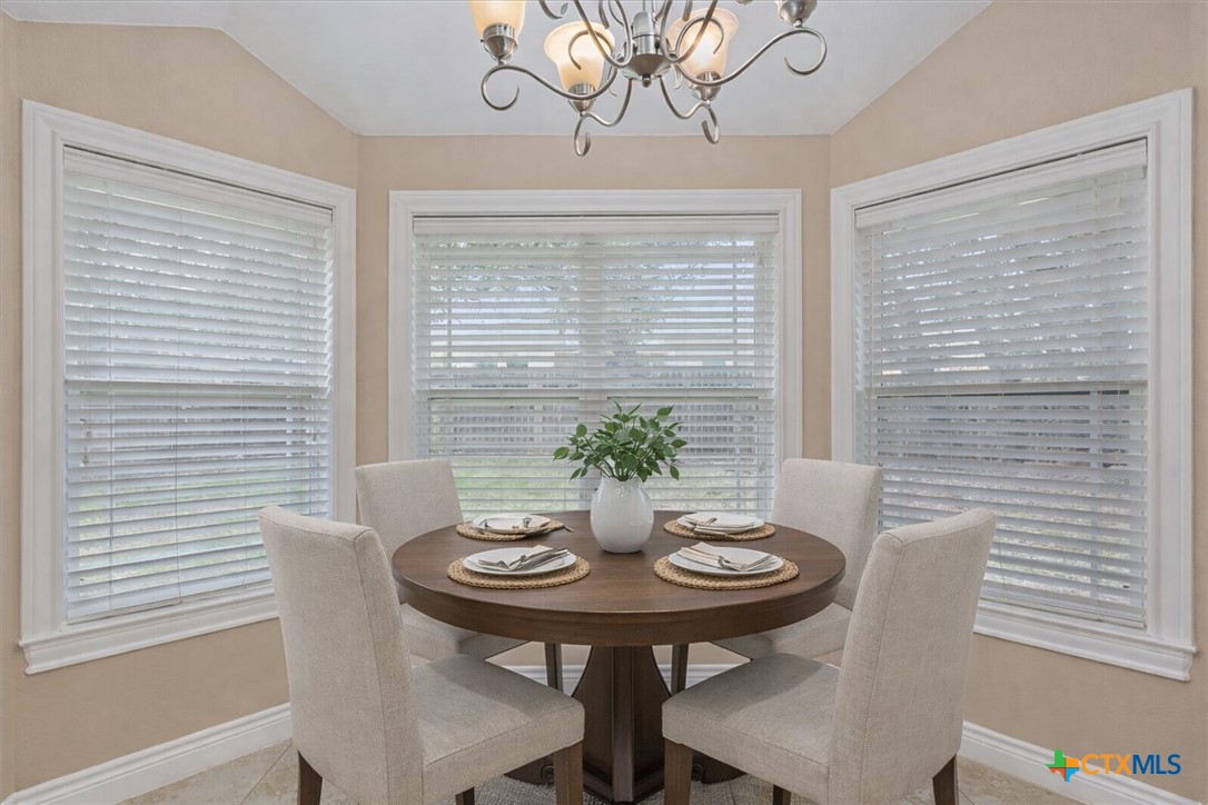 198 Sheridan Loop Belton, TX 76513 - Photo 11 of 31 a view of a dining room with furniture and window