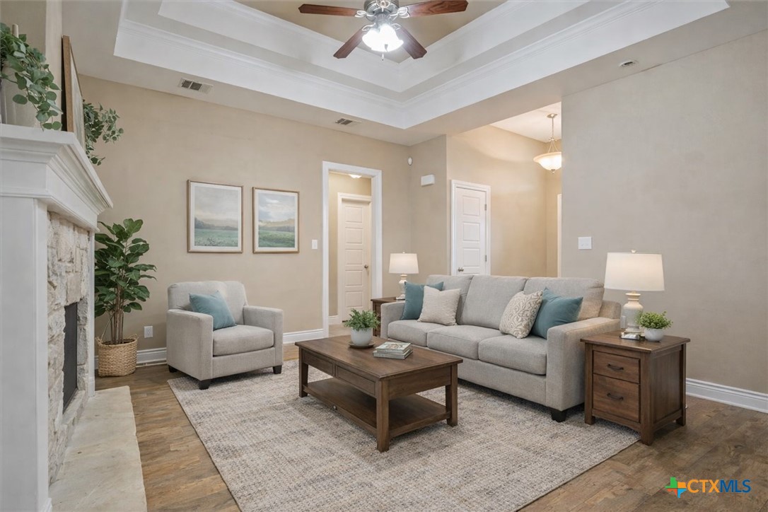 198 Sheridan Loop Belton, TX 76513 - Photo 7 of 31 a living room with furniture and a large mirror