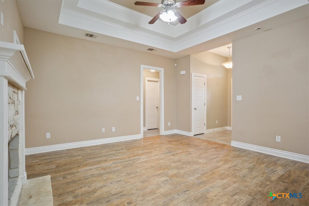 198 Sheridan Loop Belton, TX 76513 - Photo 9 of 31 a view of an empty room with a chandelier fan