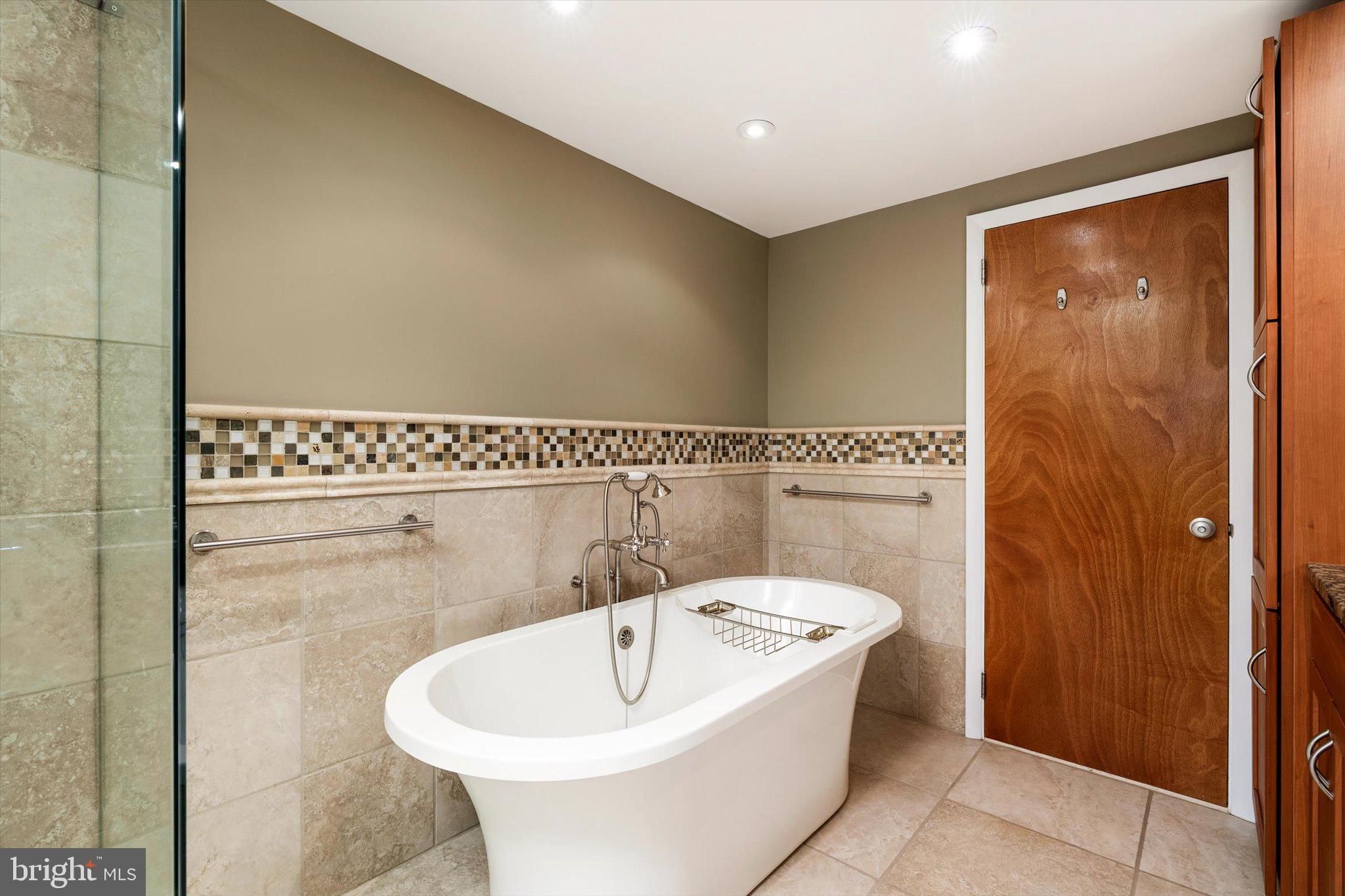 6783 Chapel Road New Hope, PA 18938 - Photo 19 of 42 Freestanding tub and glass surround shower.