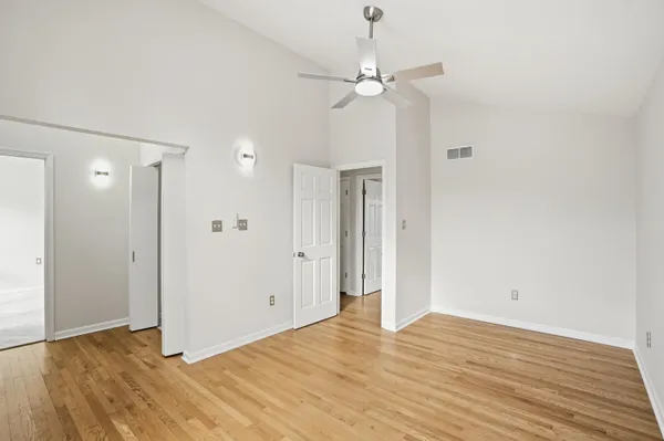 a bathroom with double sink and a mirror