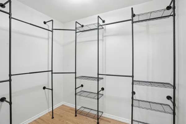 a bathroom with a shower and a sink