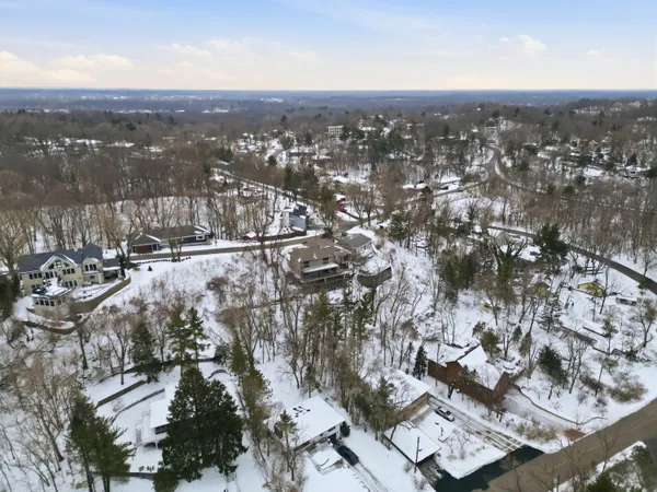 a view of a balcony with wooden floor