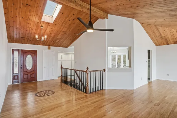 a view of balcony with wooden floor