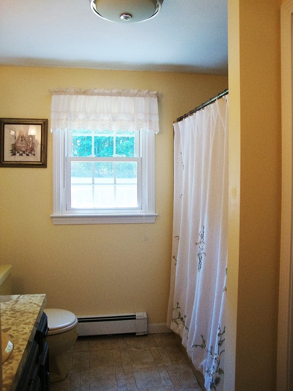 63 Pierpont Road Dudley, MA 01571 - Photo 13 of 21 a bathroom with a sink and a toilet
