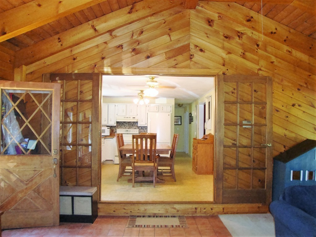 63 Pierpont Road Dudley, MA 01571 - Photo 5 of 21 a view of a patio with table and chairs