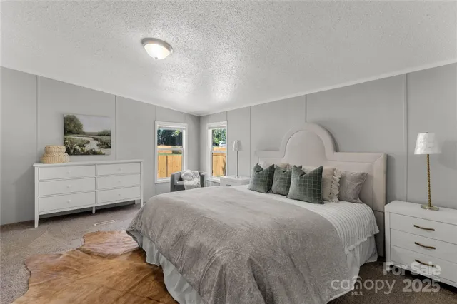 a bedroom with a bed and a closet