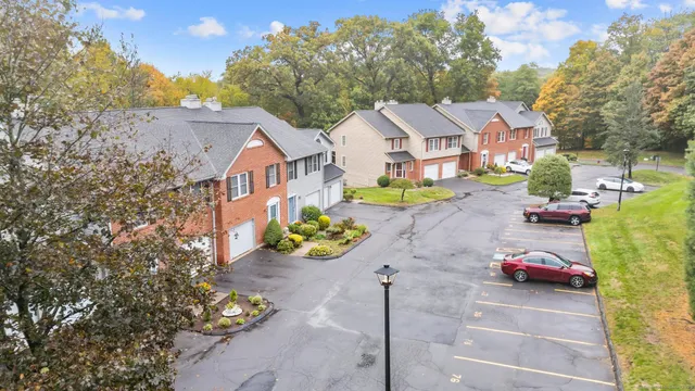 a view of a street with cars