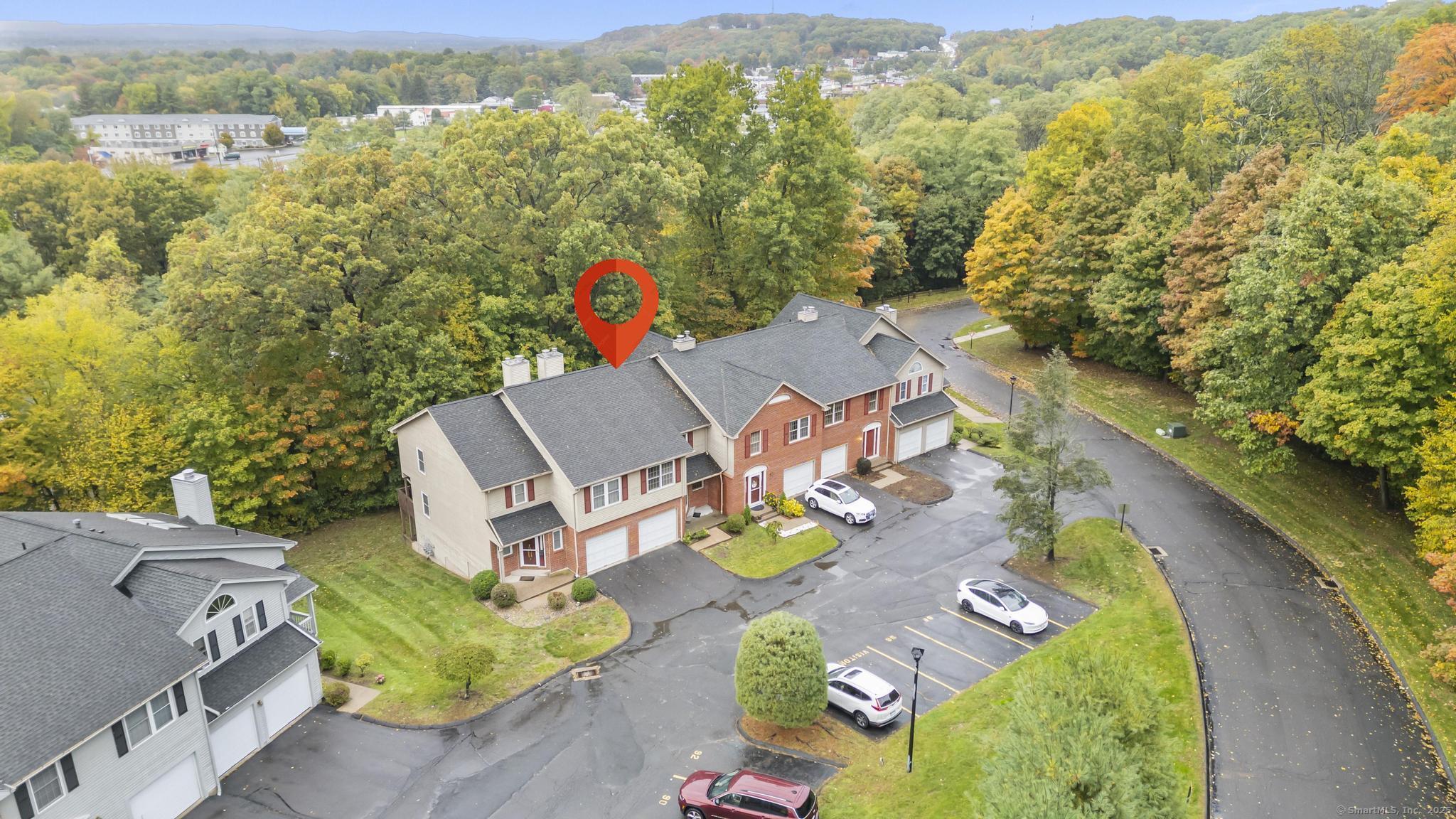 98 Crown Ridge Newington, CT 06111 - Photo 3 of 37 an aerial view of a house with a yard