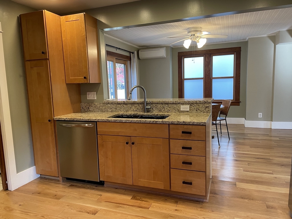 492 Elm Street Northampton, MA 01060 - Photo 17 of 31 a view of a kitchen counter space and wooden floor