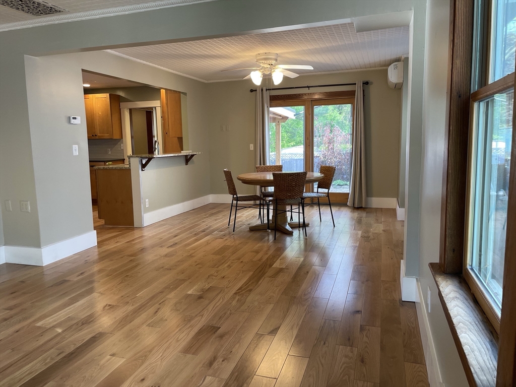 492 Elm Street Northampton, MA 01060 - Photo 20 of 31 a view of a dining room with furniture window and wooden floor